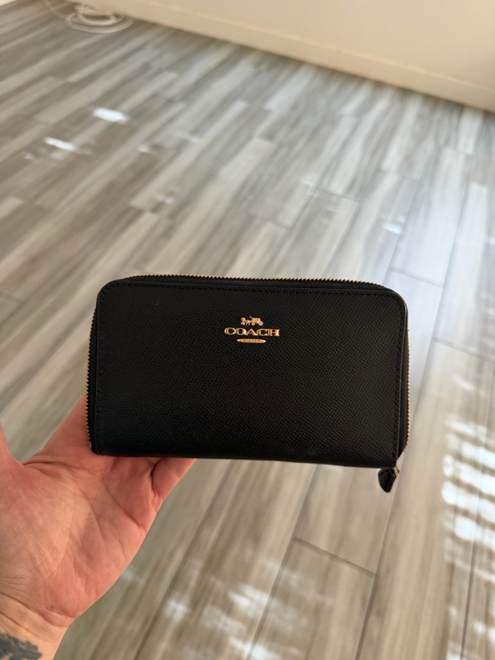 Coach Black Saffiano Zip Wallet with Gold Logo